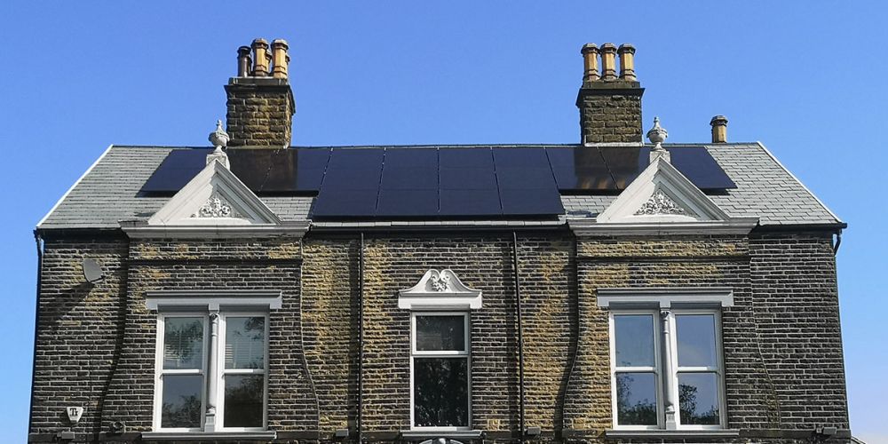 12.5kWp of all black solar panels installed on a slate roof in Batley