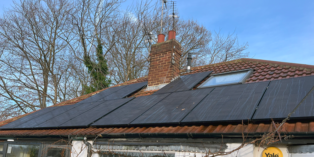 All black solar panels installed to a tiled roof in Leeds